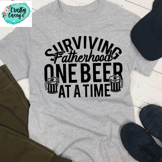 Surviving Fatherhood One Beer At A Time T-shirt