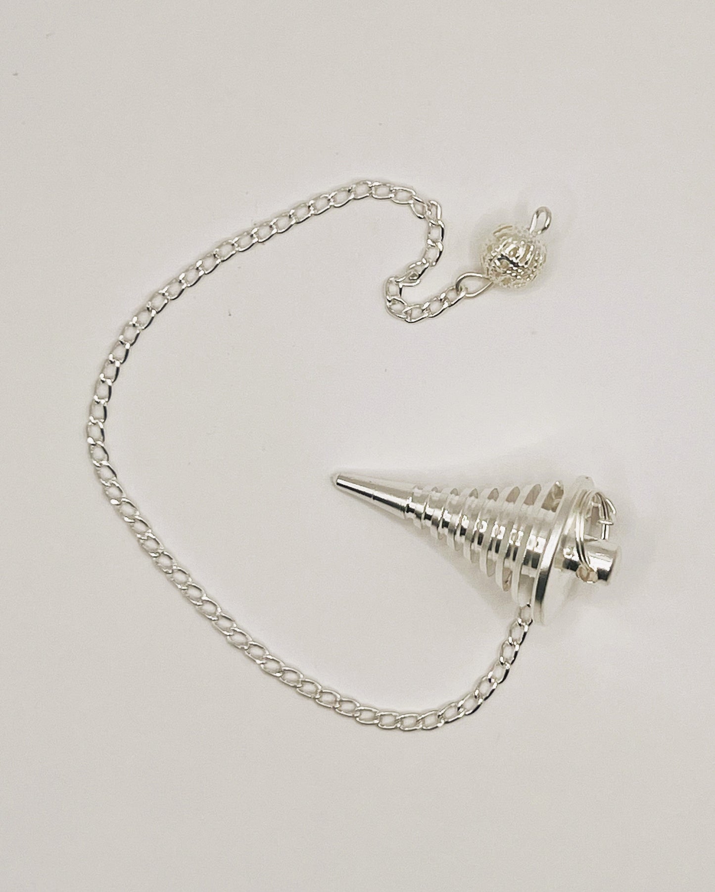 Silver Solid Spiral Pendulum by Peacefful Intentions