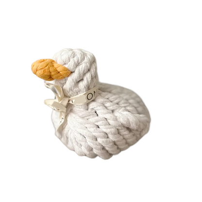 Side view of a white duck pet toy, intricately woven from durable cotton rope, designed for pets to play and chew.