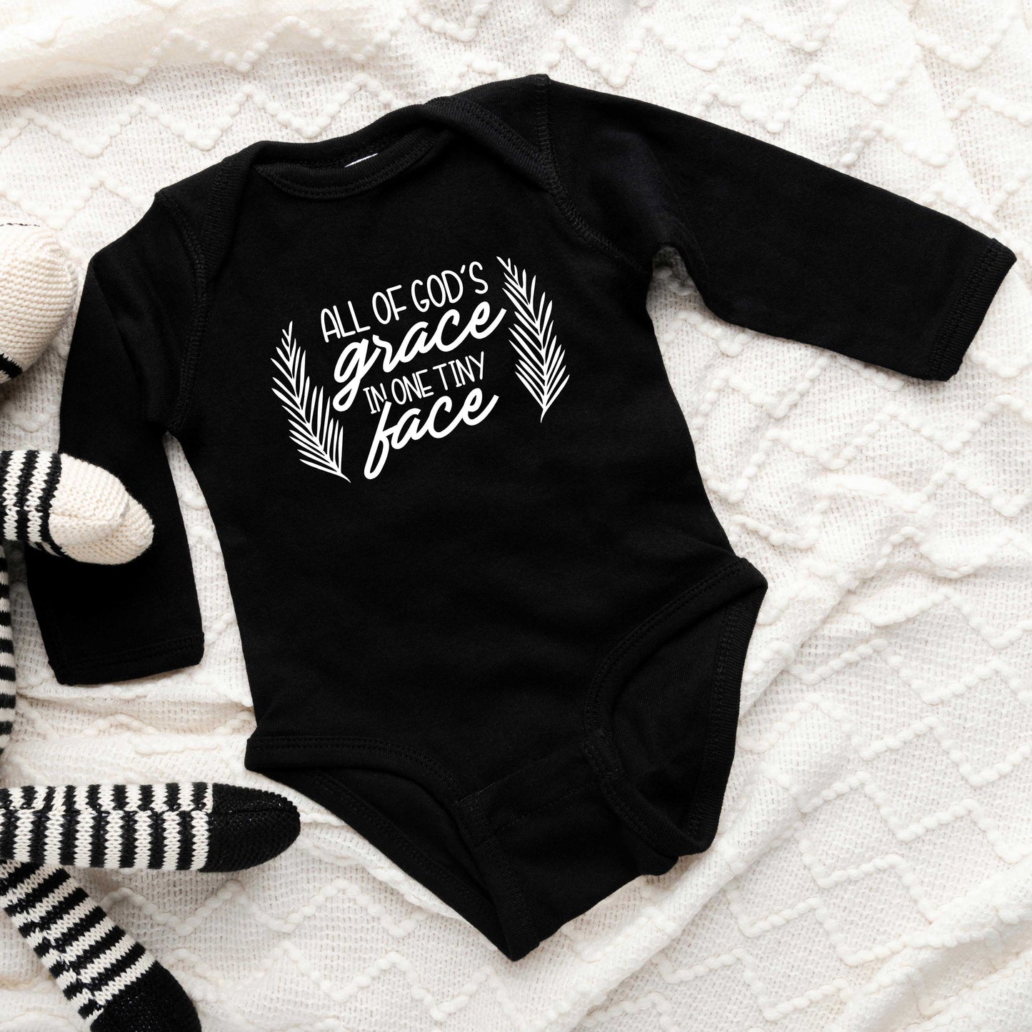 All Of God's Grace In One Tiny Face | Baby Long Sleeve Onesie by The Juniper Shop