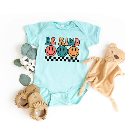 Checkered Be Kind Smiley Face | Baby Graphic Short Sleeve Onesie by The Juniper Shop