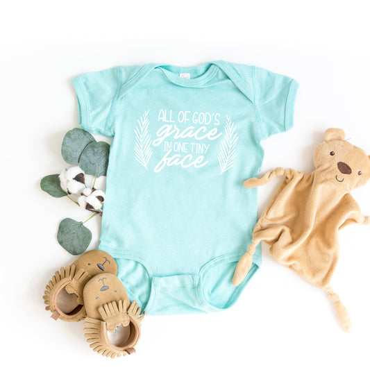 All Of God's Grace In One Tiny Face | Baby Graphic Short Sleeve Onesie by The Juniper Shop