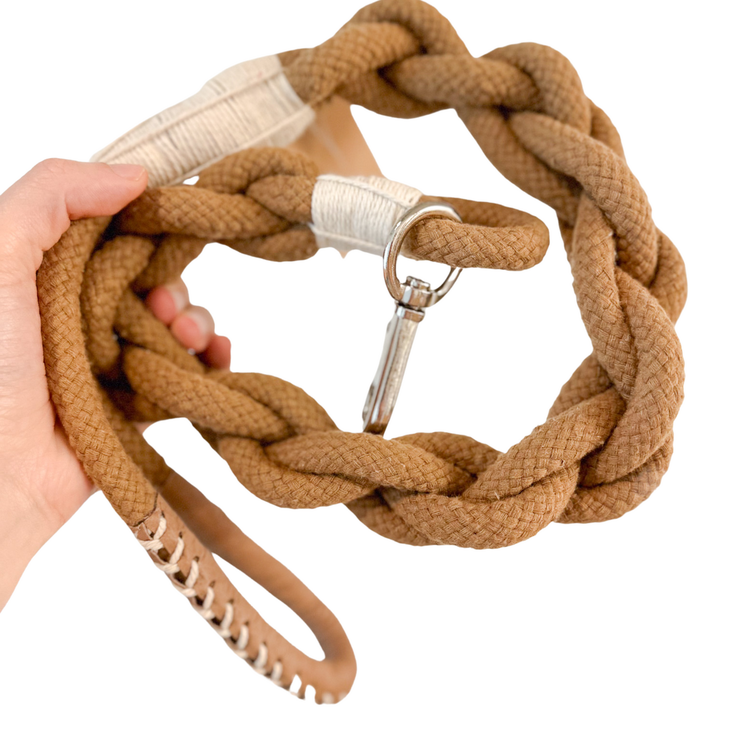 A cotton rope dog leash, handwoven with care. Durable and stylish for your furry friend.