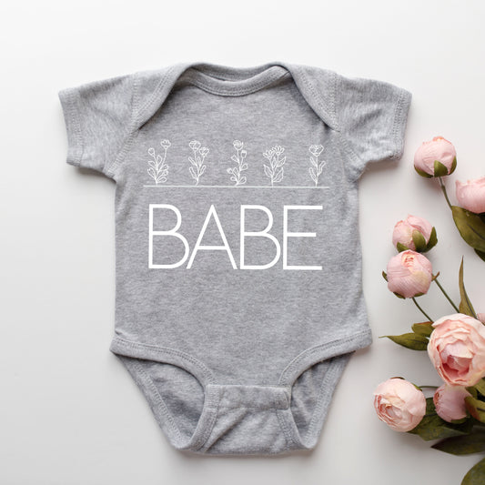 Babe Flowers | Baby Graphic Short Sleeve Onesie by The Juniper Shop