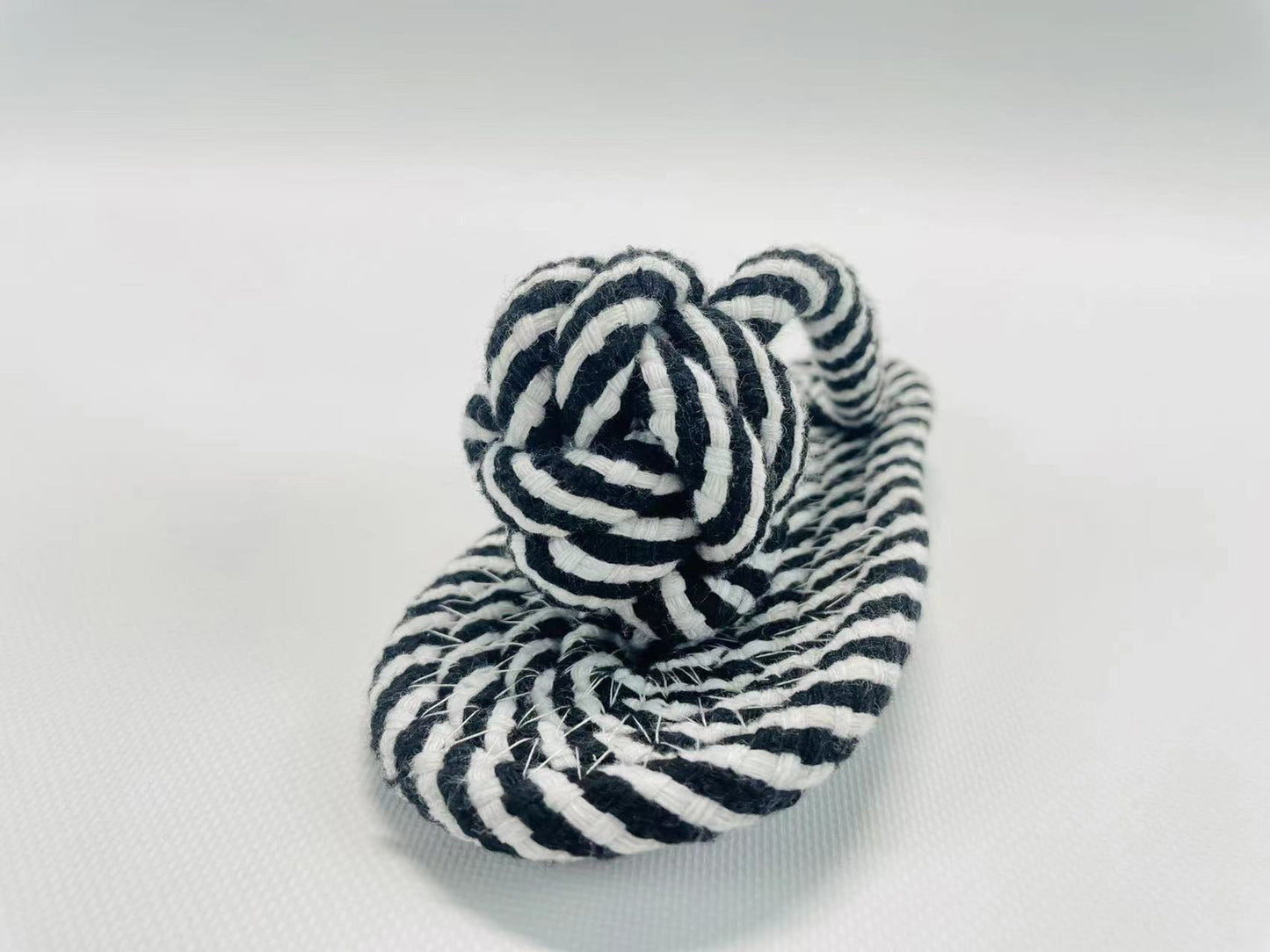 Soft cotton rope woven pet toy for playtime. Ideal for your furry friends! Comfy and fun.