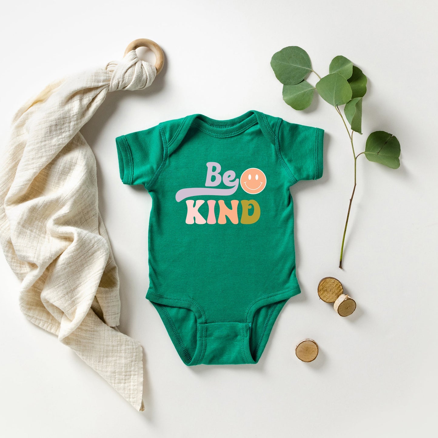 Be Kind Smiley Face | Baby Graphic Short Sleeve Onesie by The Juniper Shop