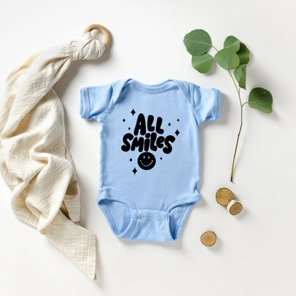 All Smiles Smiley Face | Baby Graphic Short Sleeve Onesie by The Juniper Shop