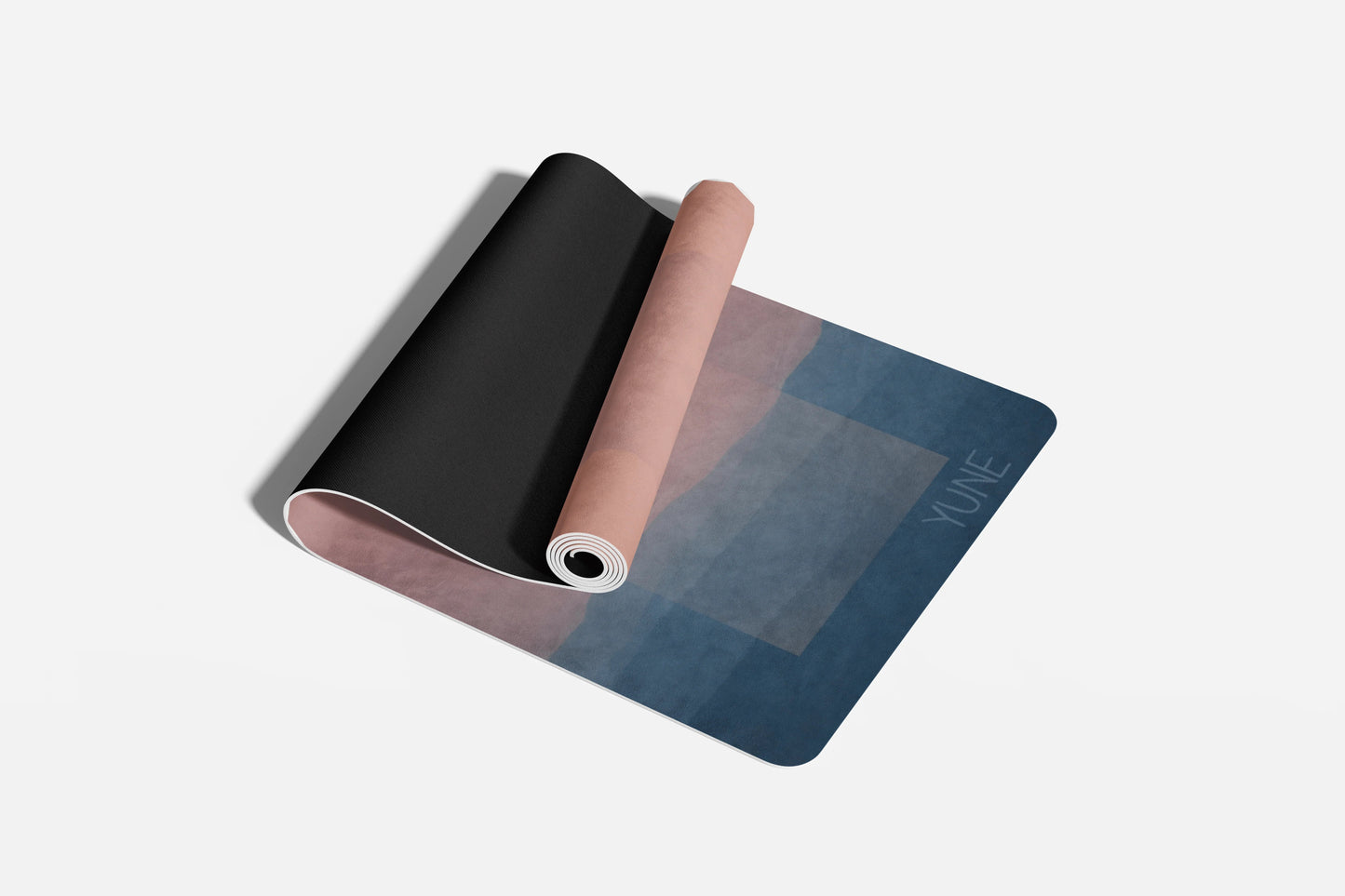 Yoga mat with a gradient design on a white background