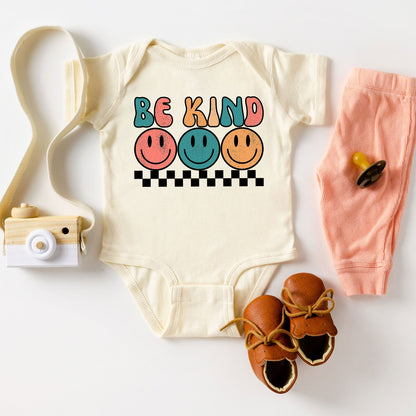 Checkered Be Kind Smiley Face | Baby Graphic Short Sleeve Onesie by The Juniper Shop