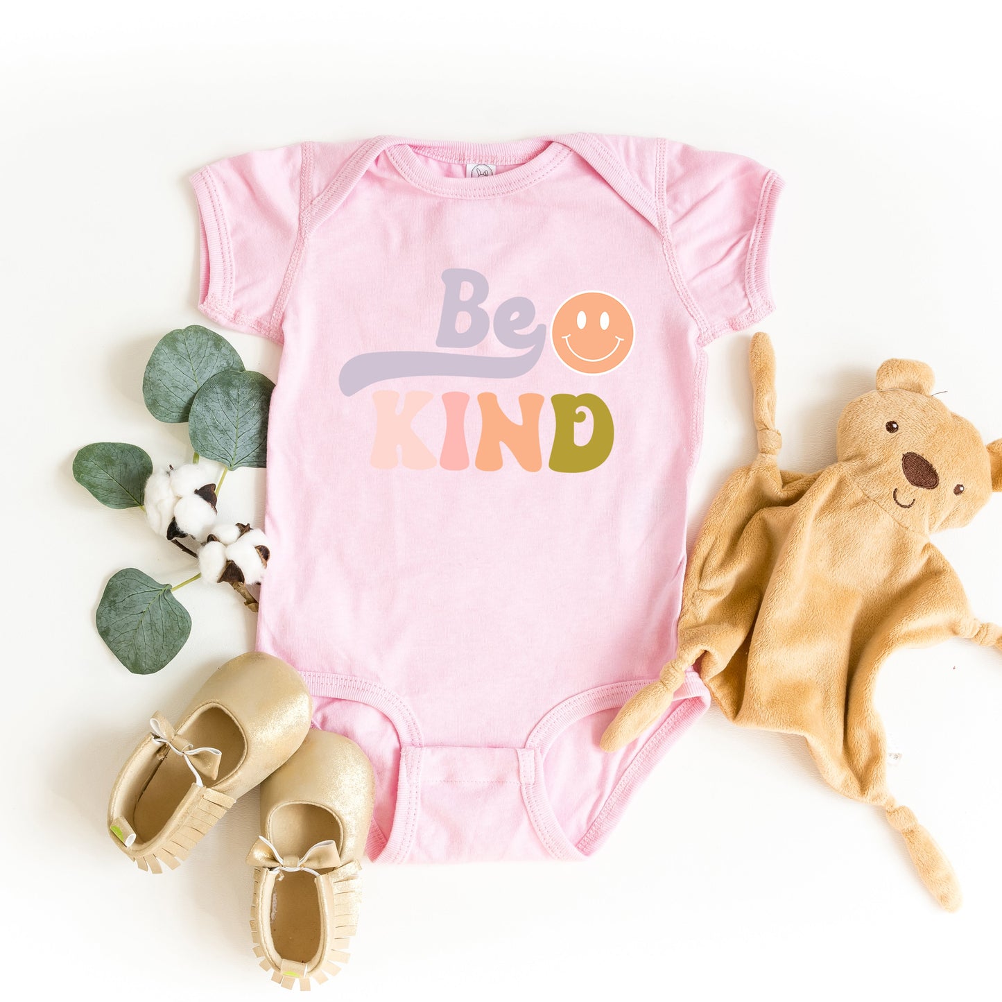 Be Kind Smiley Face | Baby Graphic Short Sleeve Onesie by The Juniper Shop