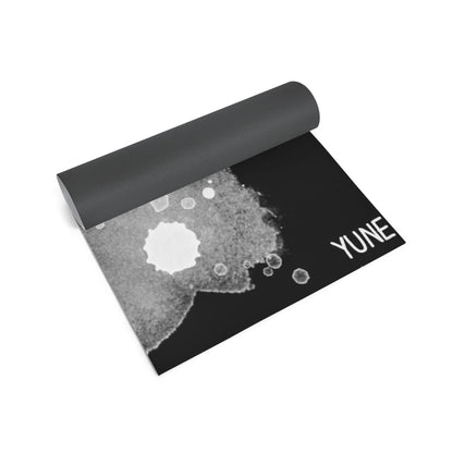 Yoga mat with black and gray design on a white background