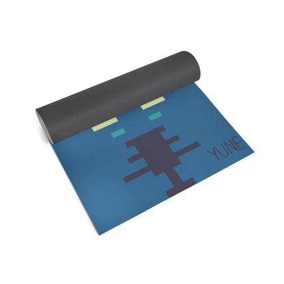 Yoga mat with robot design and 'Yune' branding on a white background