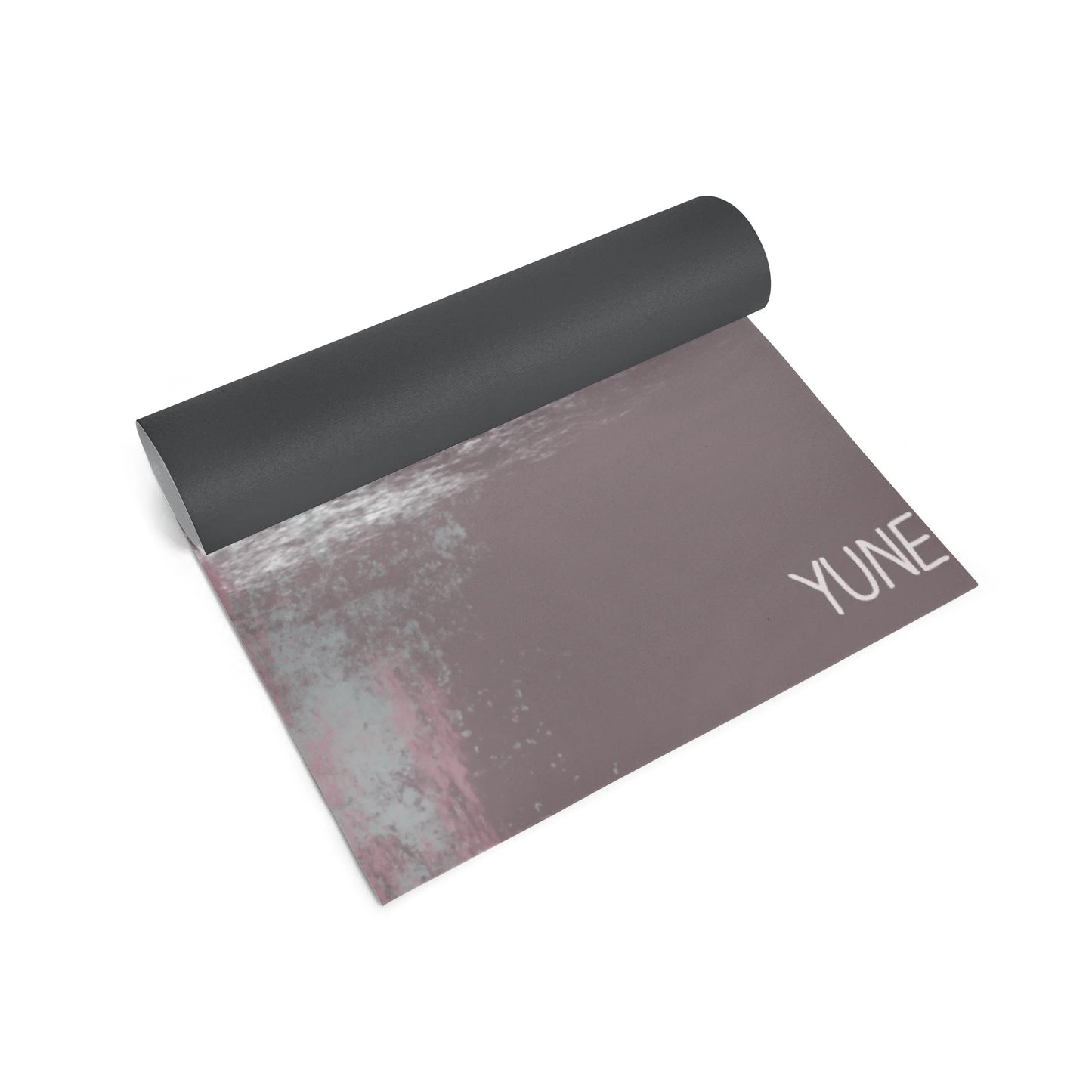 Yoga mat with a textured design and 'Yune' branding on a white background