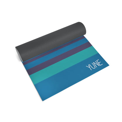 Yoga mat with blue and gray striped design on a white background