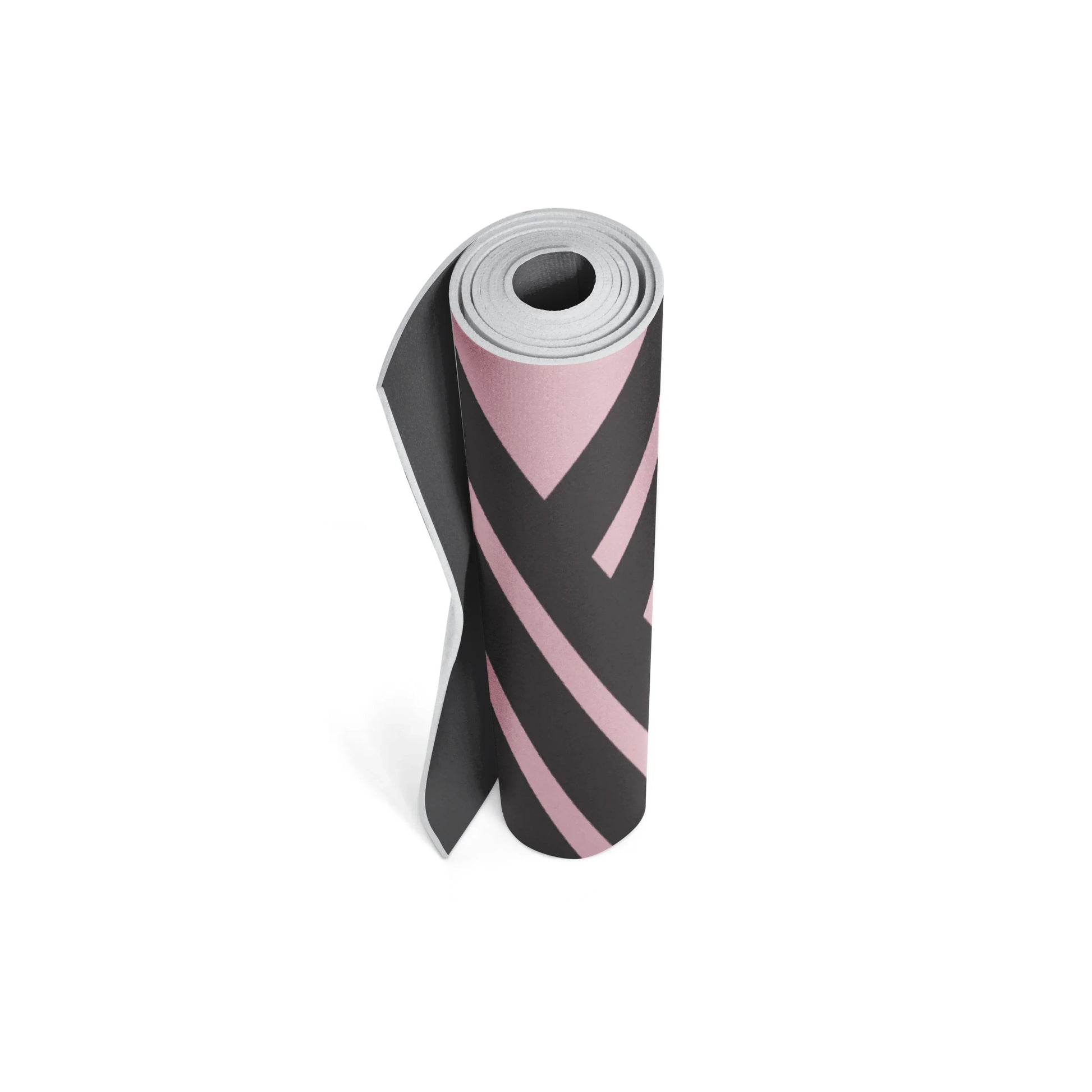 Yoga mat with pink and black striped pattern on a white background