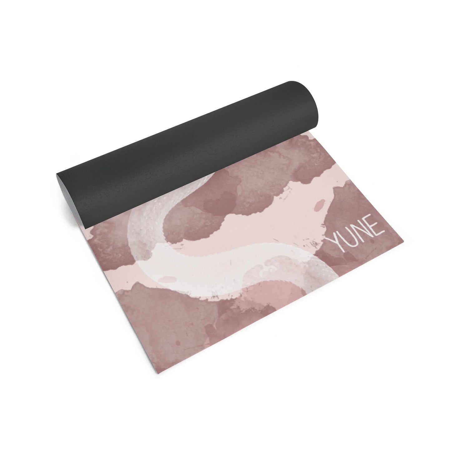Yoga mat with abstract design and 'YUNE' branding on a white background