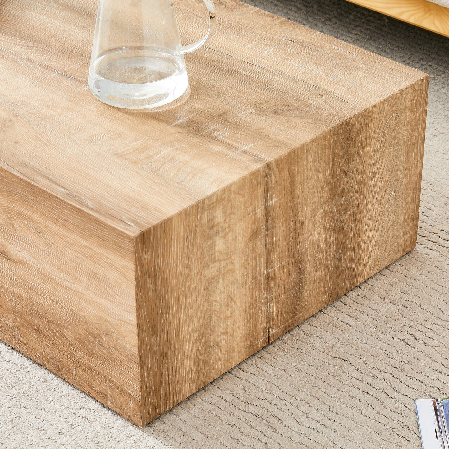 Elevate your living space with this modern MDF coffee table that showcases smooth, light wood color texture patterns. It is characterized by stylish design.39.3*23.6*12