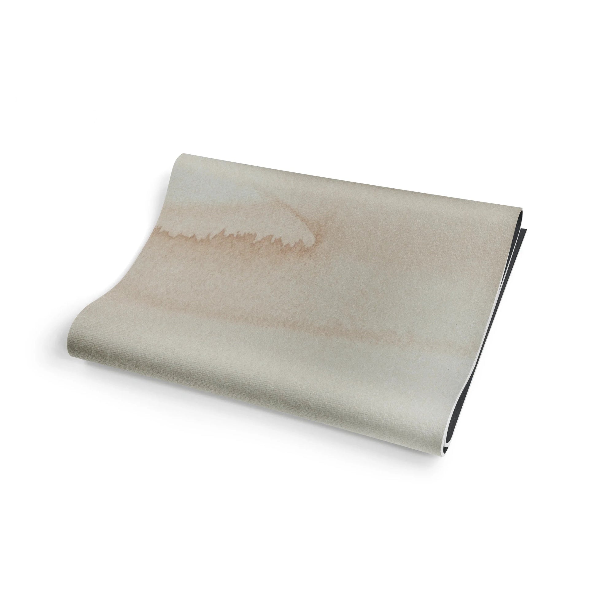 Folded fabric with watercolor design on a white background