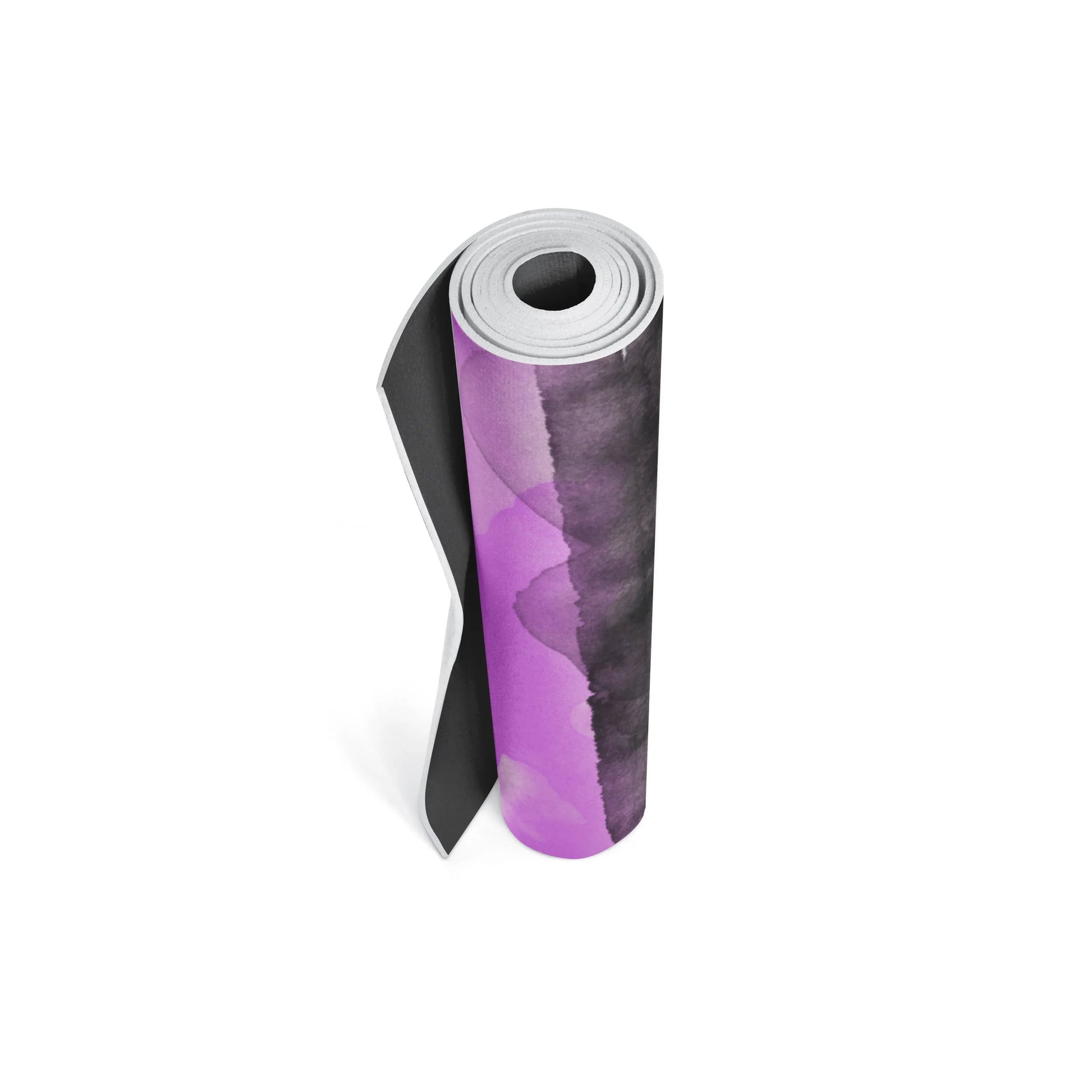 Roll of purple and black patterned paper on a white background