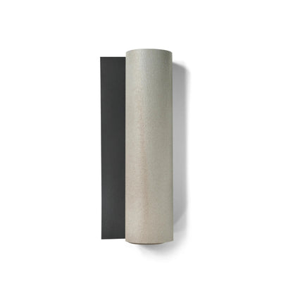 Two cylindrical objects, one black and one beige, on a white background
