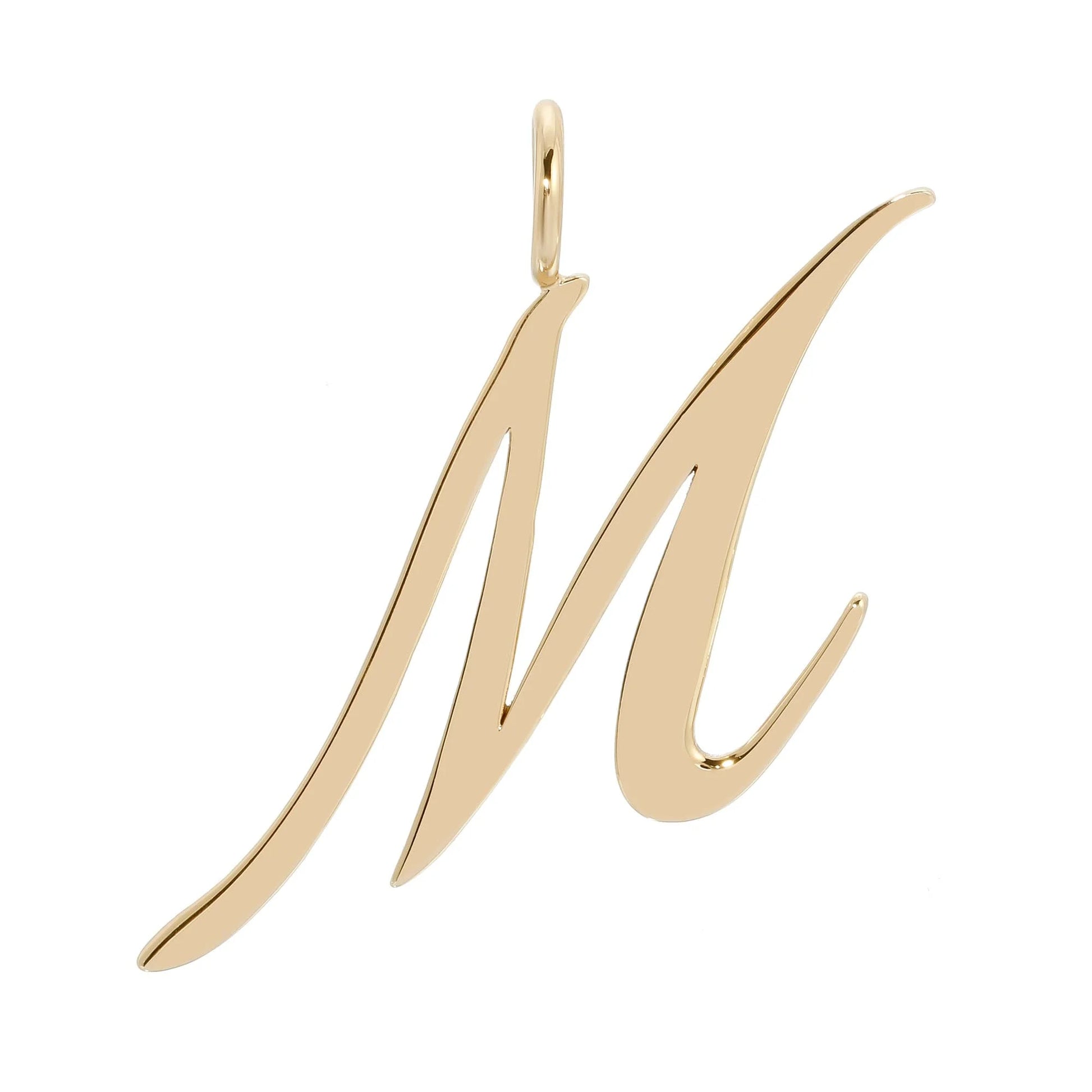 Gold letter M pendant shown in Large Letter Pendants collection on display