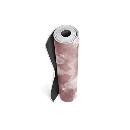 Yoga mat with pink and white pattern on a white background
