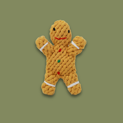 Handwoven gingerbread man pet toy made from durable cotton rope. Ideal for dogs and cats to chew, play, and enjoy. A festive and sturdy addition to your pet's toy collection.